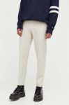 Штани Tommy Jeans чоловічі колір бежевий фасон chinos