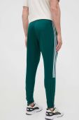 Спортивні штани adidas колір зелений з принтом (3303015)