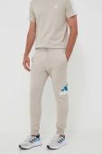 Спортивні штани adidas колір бежевий з принтом