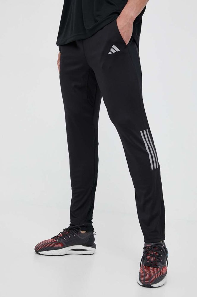 Штани для бігу adidas Performance Own the Run колір чорний з принтом
