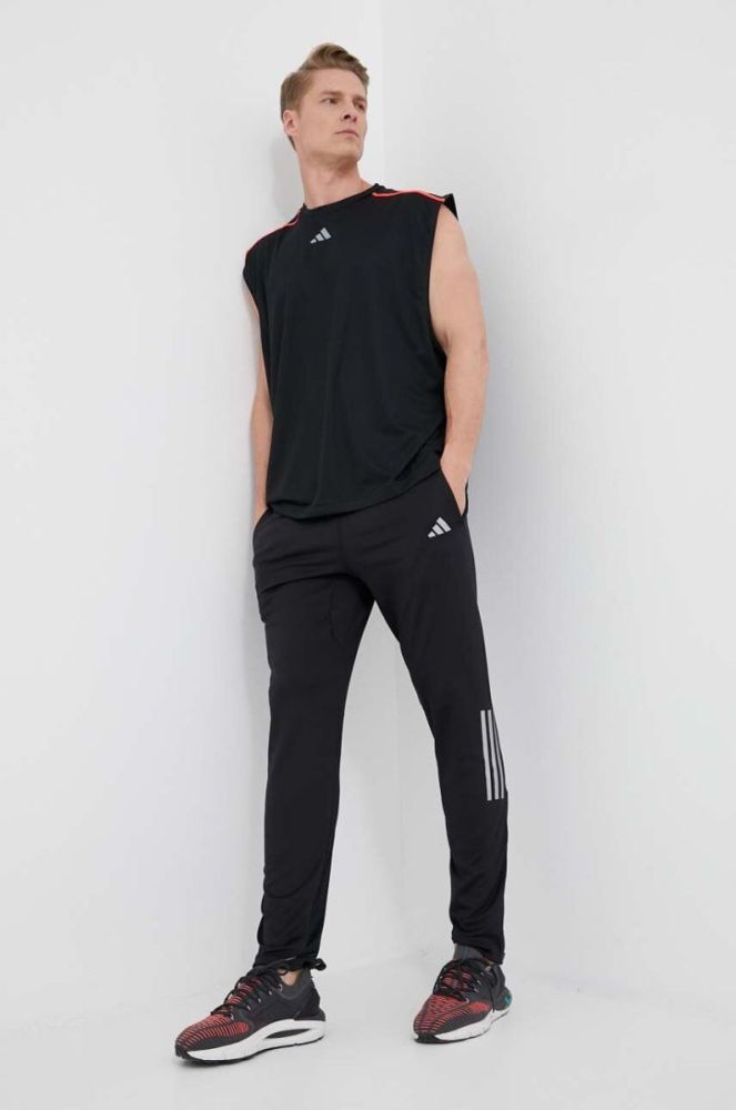 Штани для бігу adidas Performance Own the Run колір чорний з принтом фото 2