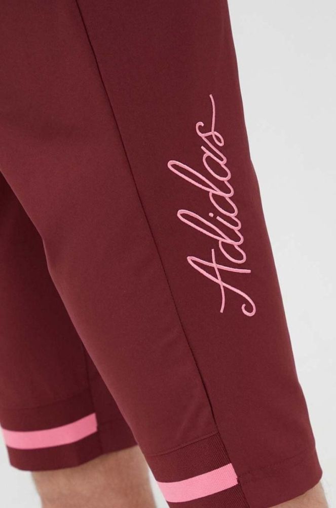 Штани adidas чоловічі колір бордовий фото 3