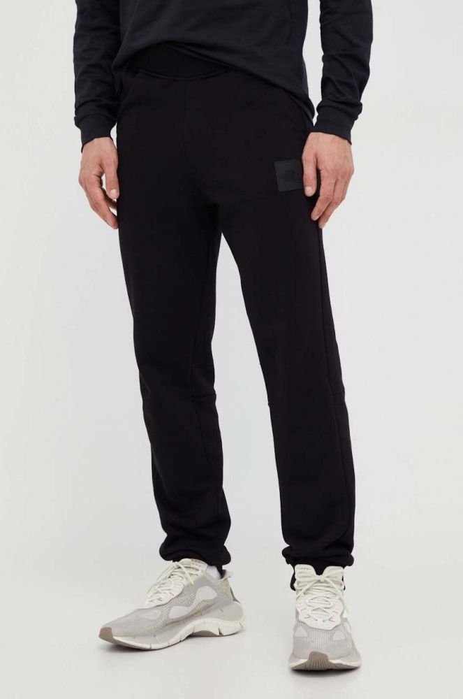 Бавовняні спортивні штани The North Face колір чорний з принтом (3520407)
