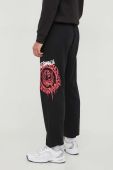 Бавовняні спортивні штани Just Cavalli колір чорний з принтом