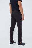 Штани для тренувань Puma Evostripe колір чорний з принтом