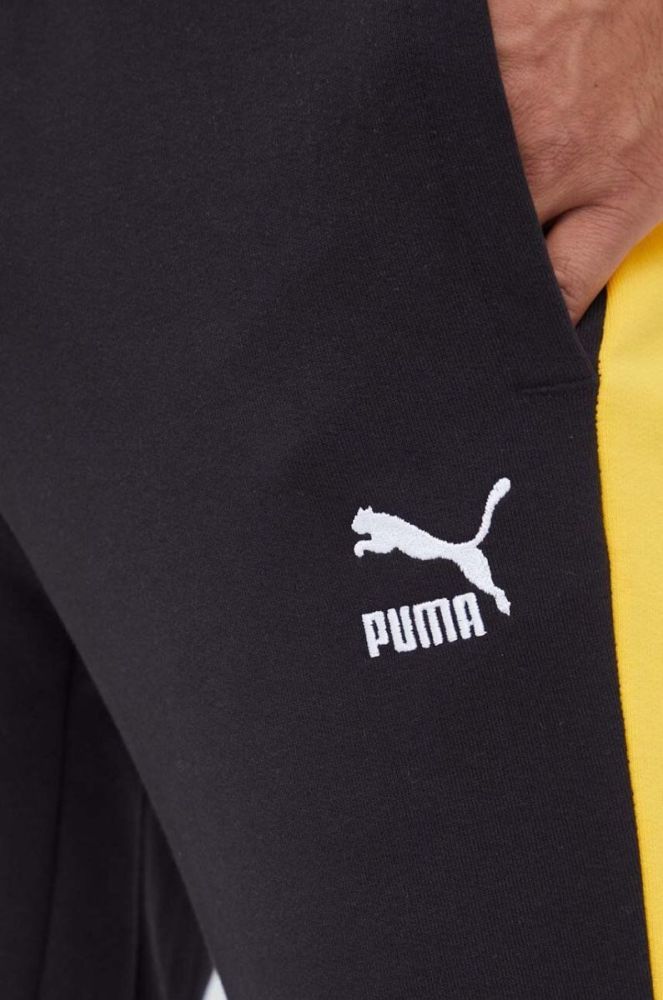 Дитячі бавовняні штани Puma колір чорний візерунок фото 4