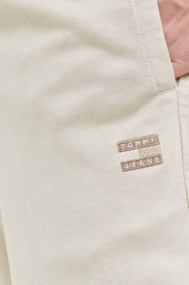Бавовняні спортивні штани Tommy Jeans колір бежевий однотонні фото 4