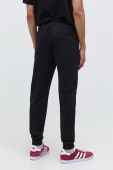 Бавовняні спортивні штани HUGO колір чорний з аплікацією (3610485)