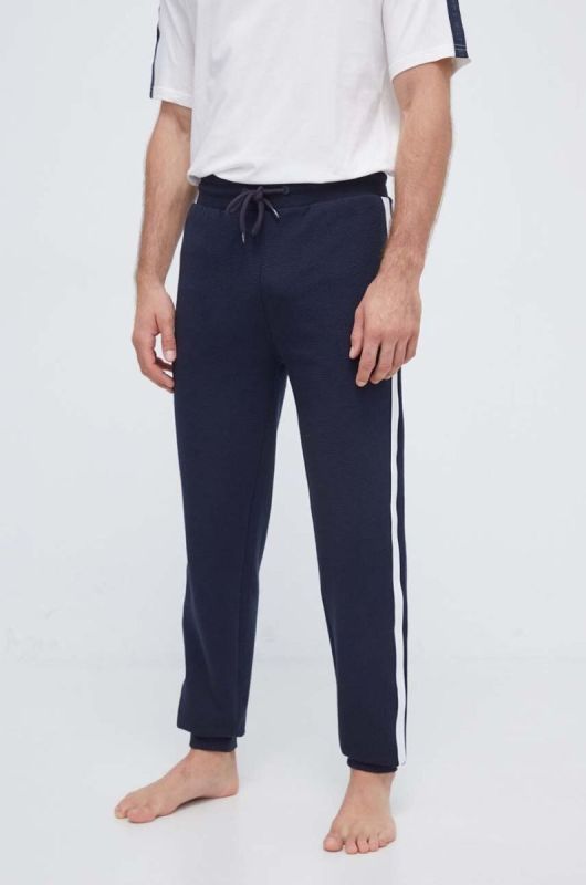 Бавовняні спортивні штани Tommy Hilfiger колір синій з аплікацією (3582898)