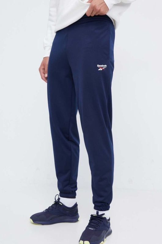 Спортивні штани Reebok колір синій однотонні (3555181)