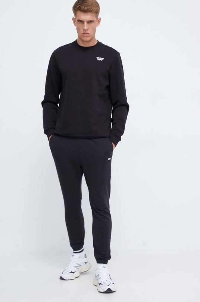 Штани Reebok чоловічі колір чорний однотонні фото 2