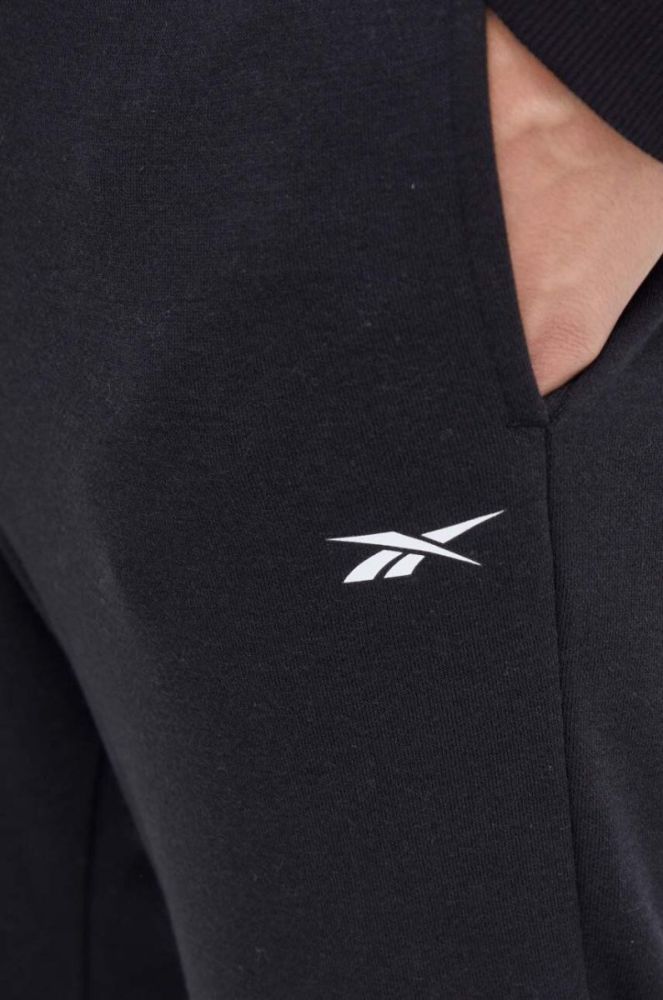 Штани Reebok чоловічі колір чорний однотонні фото 4