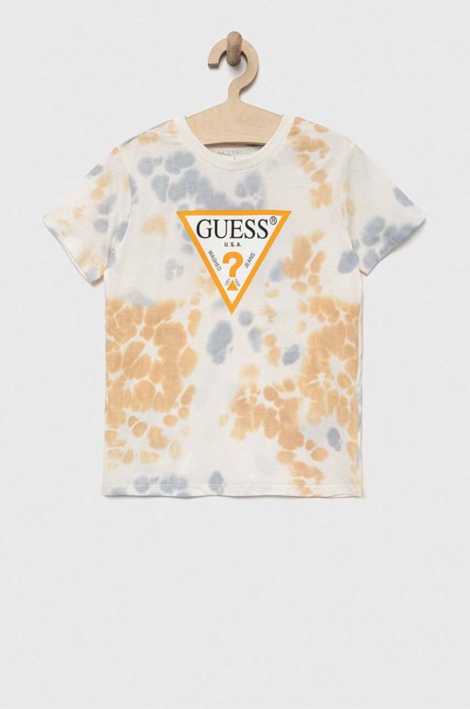 Дитяча бавовняна футболка Guess колір бежевий візерунок (3294249)