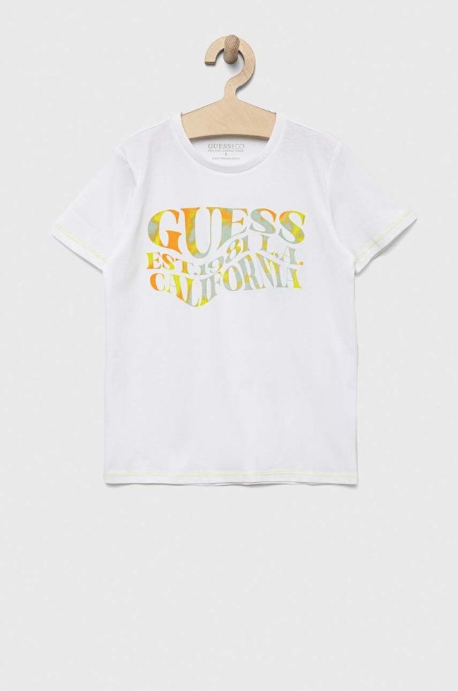 Дитяча бавовняна футболка Guess колір білий з принтом (3294263)