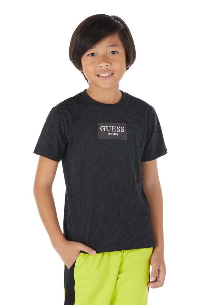 Дитяча бавовняна футболка Guess колір чорний візерунок (3294298)