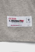 Дитяча бавовняна футболка Guess x Brandalised колір сірий з принтом