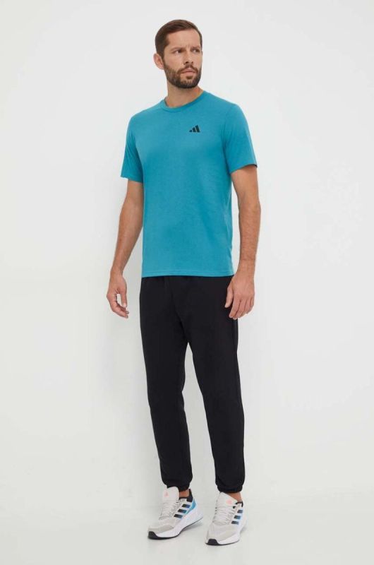 Тренувальна футболка adidas Performance Train Essentials колір зелений однотонна фото 2