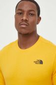Бавовняна футболка The North Face колір жовтий з принтом