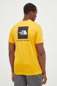 Бавовняна футболка The North Face колір жовтий з принтом