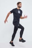 Тренувальна футболка Under Armour колір чорний з принтом