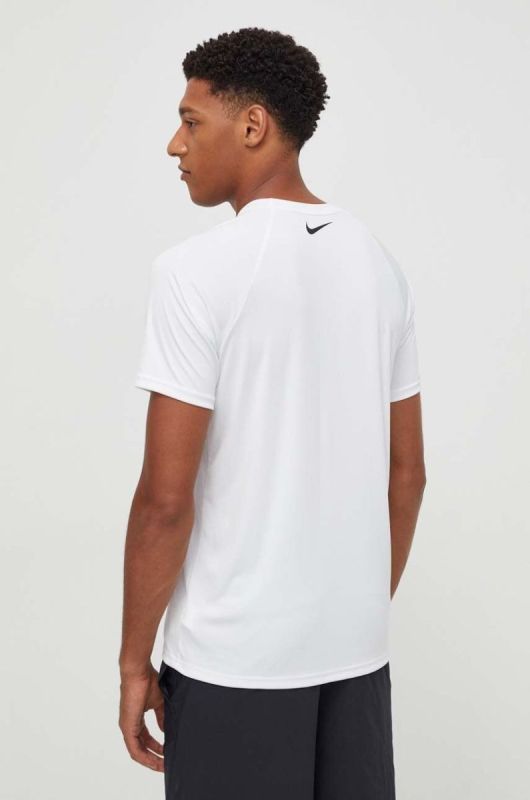 Тренувальна футболка Nike колір білий з принтом фото 2