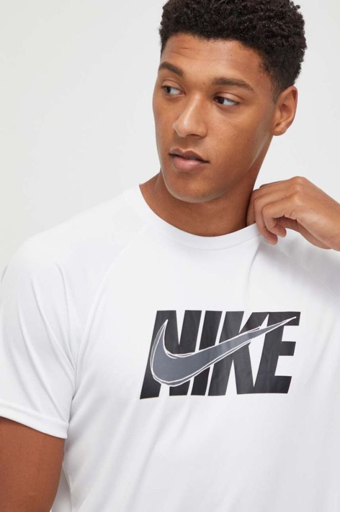 Тренувальна футболка Nike колір білий з принтом фото 3