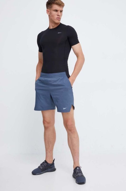 Тренувальна футболка Reebok Compression колір чорний однотонна фото 2
