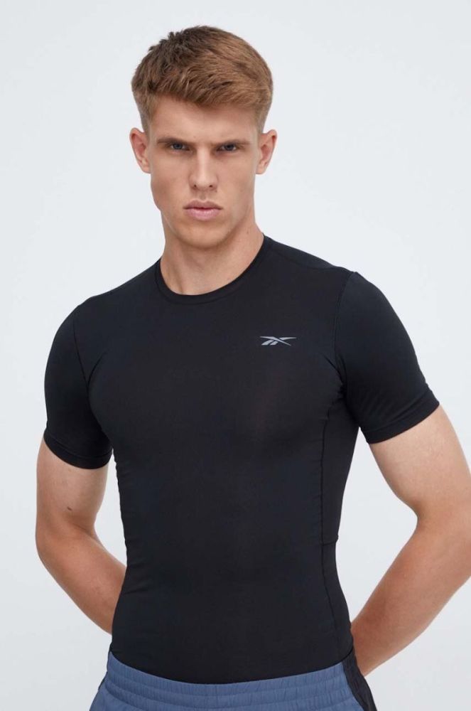 Тренувальна футболка Reebok Compression колір чорний однотонна фото 4