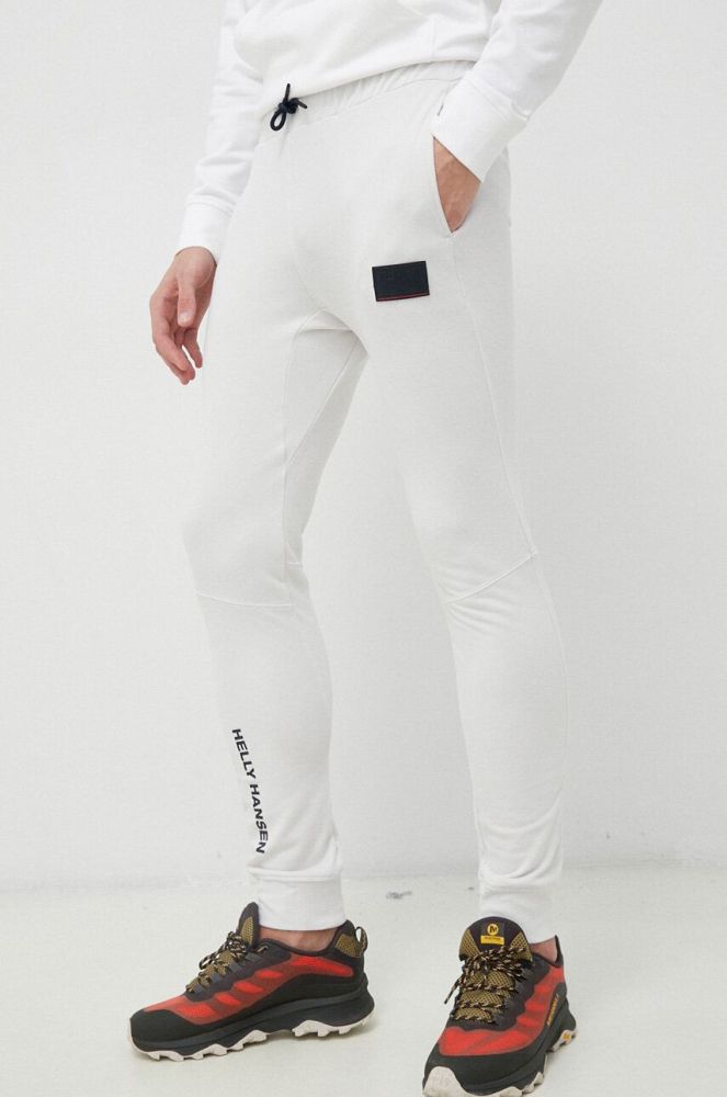 Спортивні штани Helly Hansen колір білий однотонні