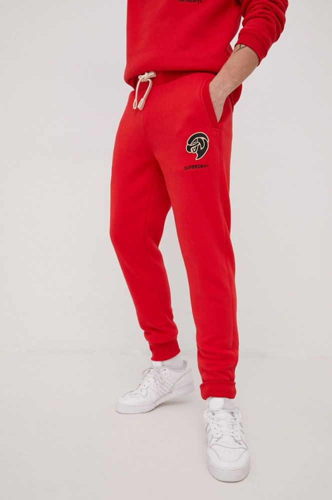 Спортивні штани Superdry чоловічі колір червоний з аплікацією