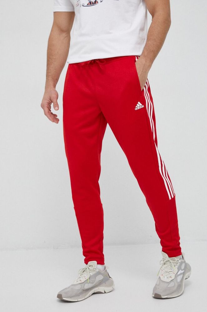 Спортивні штани adidas колір червоний з принтом