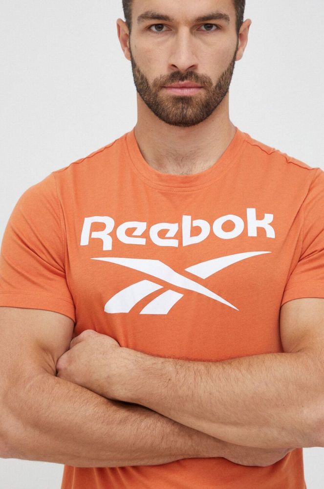 Бавовняна футболка Reebok колір помаранчевий з принтом