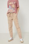 Бавовняні штани Medicine жіночі колір бежевий фасон jogger висока посадка