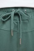 Спортивні штани Medicine жіночі колір зелений однотонні (3390081)