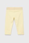 Дитячі легінси Guess колір жовтий однотонні
