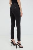 Штани Guess жіночі колір чорний облягаюче середня посадка