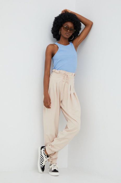 Штани Reebok H56375 жіночі колір бежевий однотонні