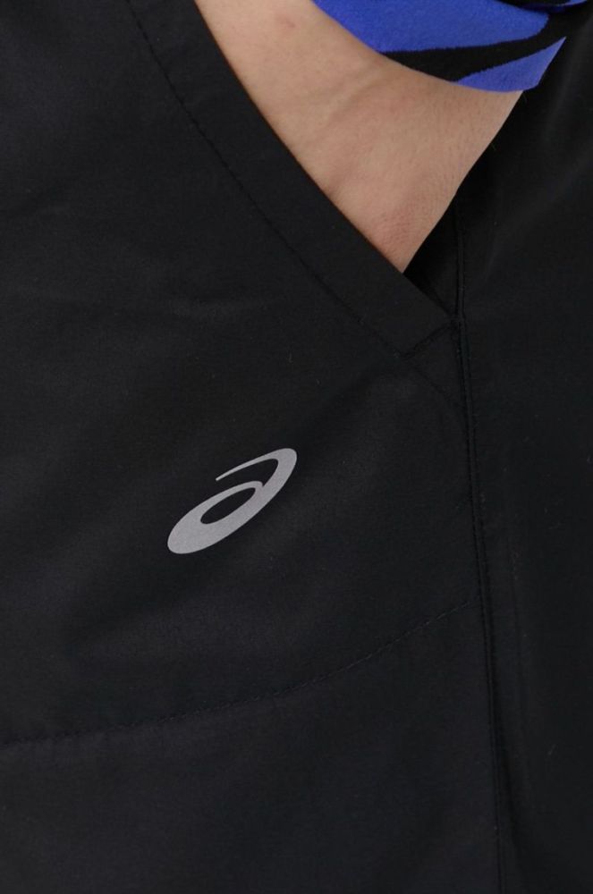 Штани для бігу Asics Core жіночі колір чорний однотонні фото 3