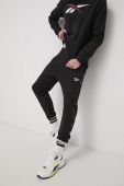 Штани Reebok HA1070 чоловіче колір чорний гладке