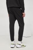 Штани Reebok HA1070 чоловіче колір чорний гладке