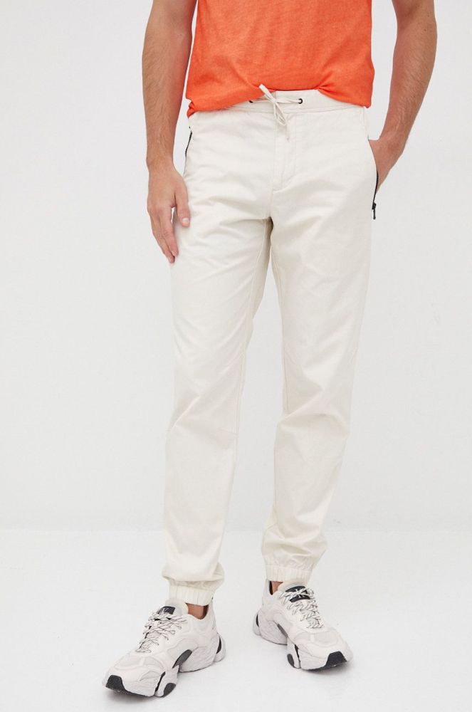 Бавовняні штани Sisley чоловічі колір бежевий фасон jogger