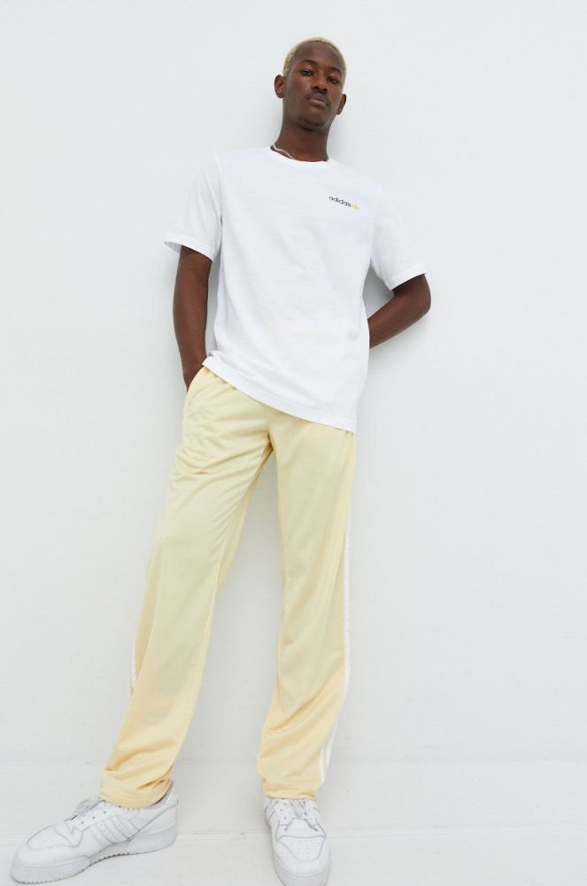 Спортивні штани adidas Originals чоловічі колір жовтий однотонні
