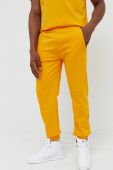 Бавовняні спортивні штани Arkk Copenhagen колір жовтий однотонні