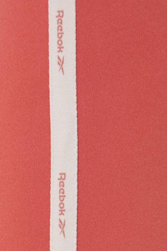 Шорти для тренувань Reebok Piping HA5725 жіночі колір помаранчевий з аплікацією середня посадка фото 3