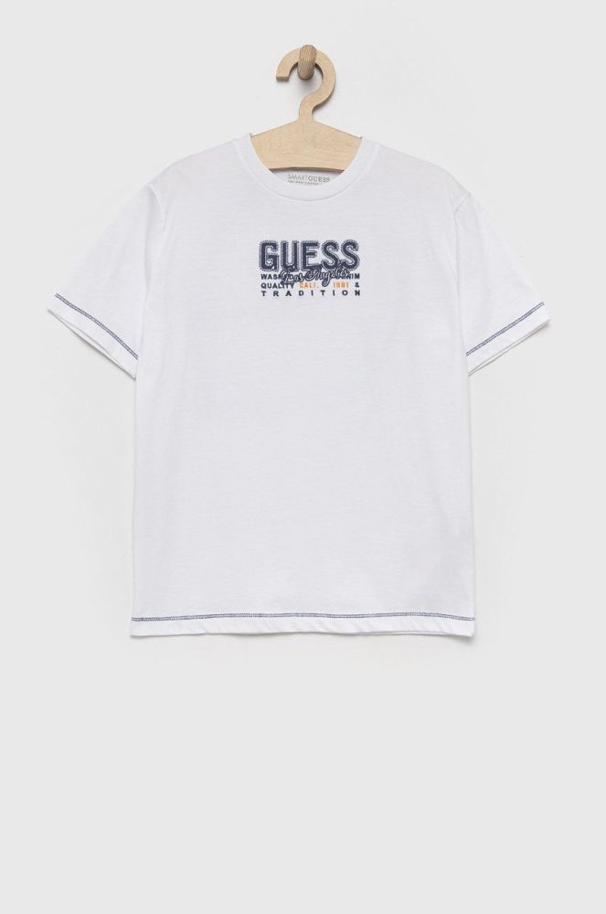 Дитяча бавовняна футболка Guess колір білий з принтом (2054170)