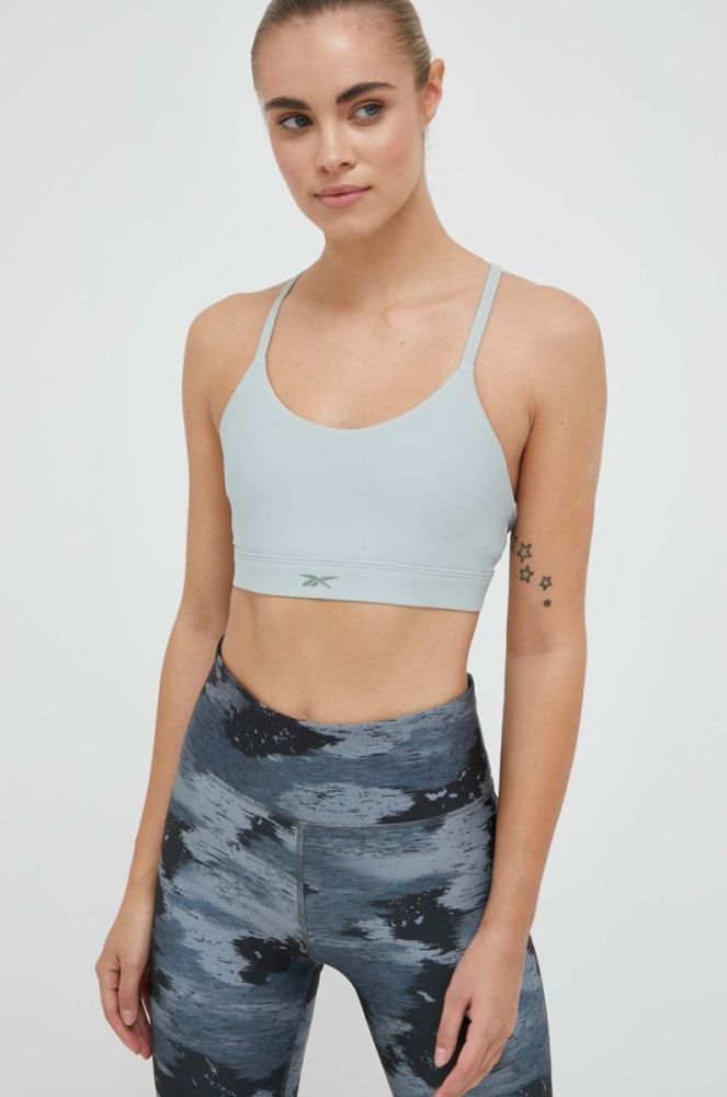 Бюстгальтер для йоги Reebok колір зелений однотонний фото 3