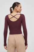 Лонгслів 4F жіночий колір фіолетовий оголена спина