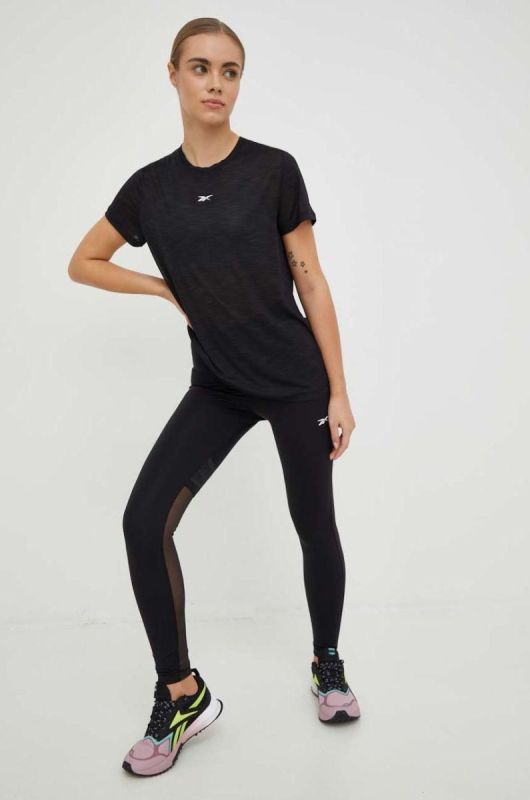 Легінси для тренувань Reebok Lux Perform жіночі колір чорний однотонні фото 2