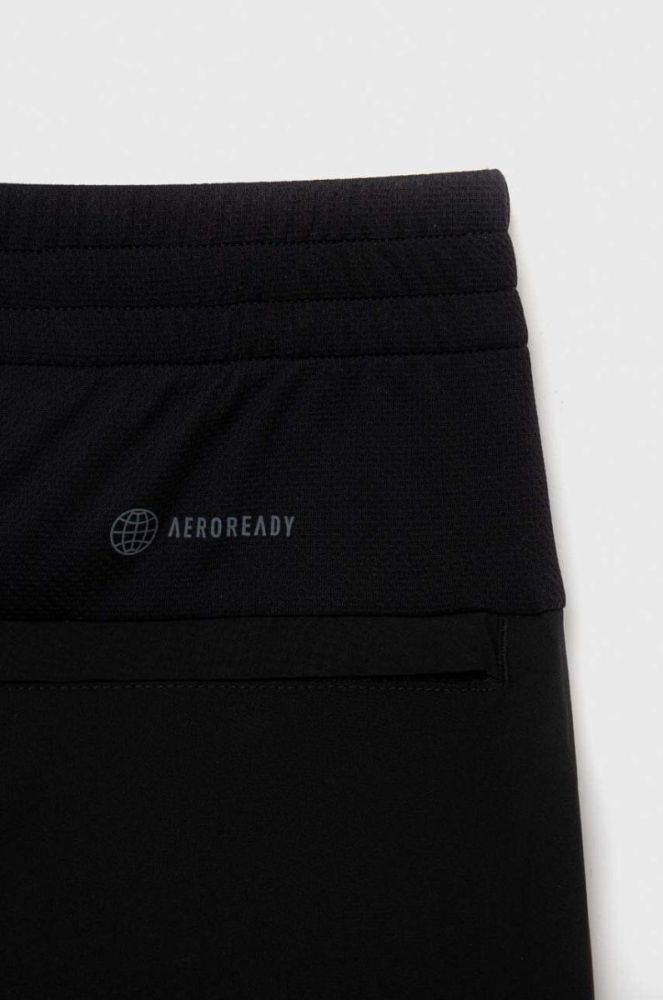 Дитячі спортивні штани adidas U RUN WV колір чорний з принтом фото 4