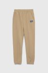 Дитячі бавовняні штани Fila колір бежевий однотонні Дитячі бавовняні штани Fila колір бежевий однотонні
